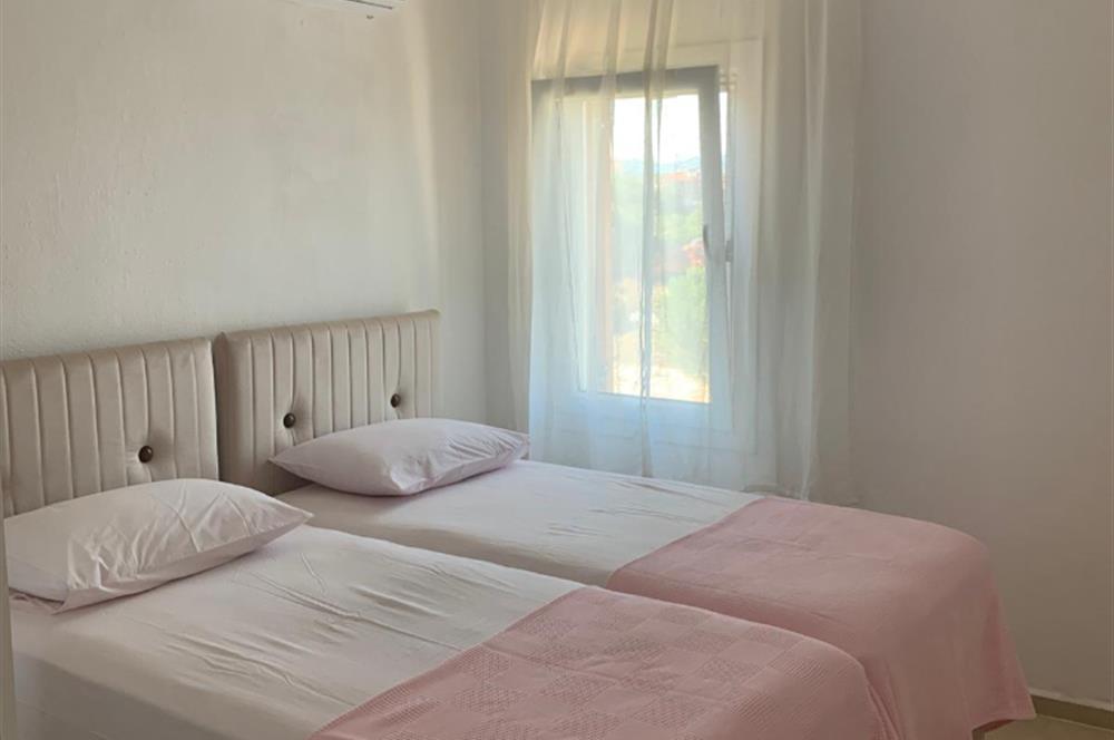 DATÇA MERKEZDE PANORAMİK DENİZ MANZARALI FULL EŞYALI KİRALIK2+1
