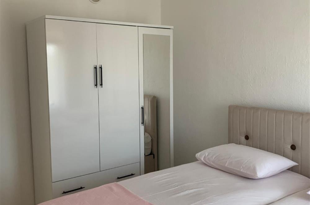 DATÇA MERKEZDE PANORAMİK DENİZ MANZARALI FULL EŞYALI KİRALIK2+1