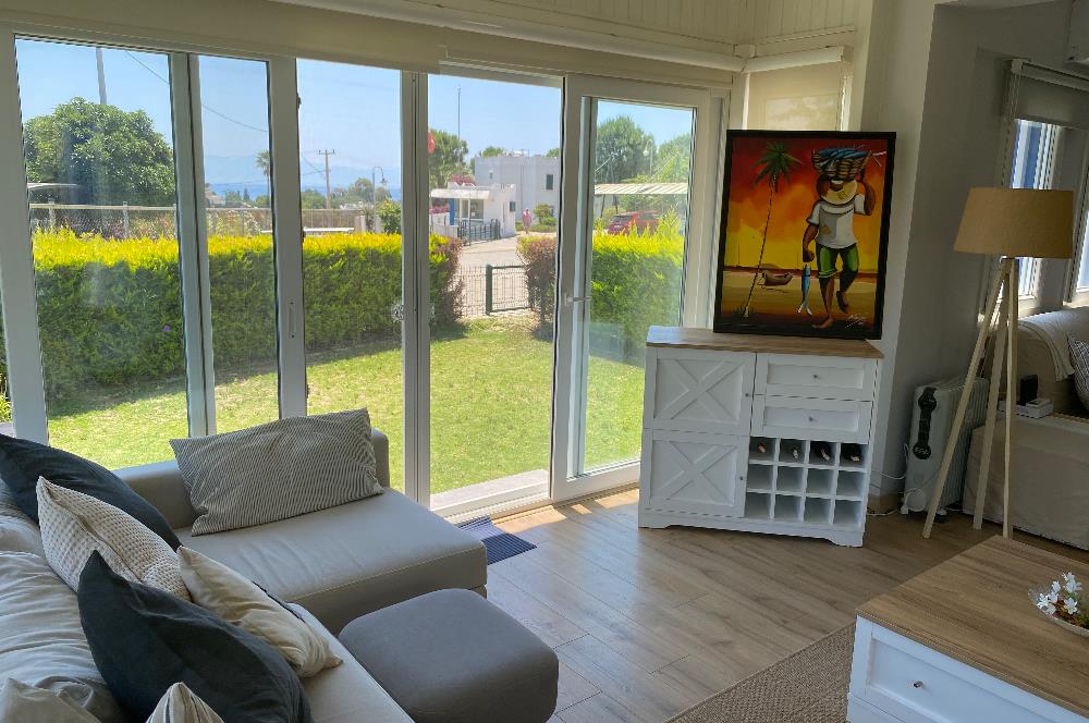 Bodrum Ortakent Yahşi’de Özel Kum Plajlı - Havuzlu Site İçerisinde Kiralık Deniz Manzaralı Müstakil Bahçeli Dubleks