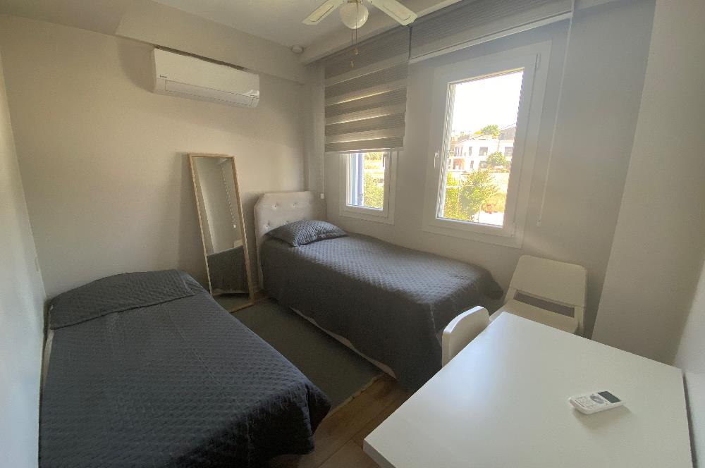 Bodrum Ortakent Yahşi’de Özel Kum Plajlı - Havuzlu Site İçerisinde Kiralık Deniz Manzaralı Müstakil Bahçeli Dubleks