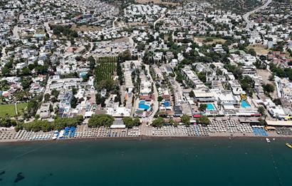 Bodrum Ortakent Yahşi’de Özel Kum Plajlı - Havuzlu Site İçerisinde Kiralık Deniz Manzaralı Müstakil Bahçeli Dubleks