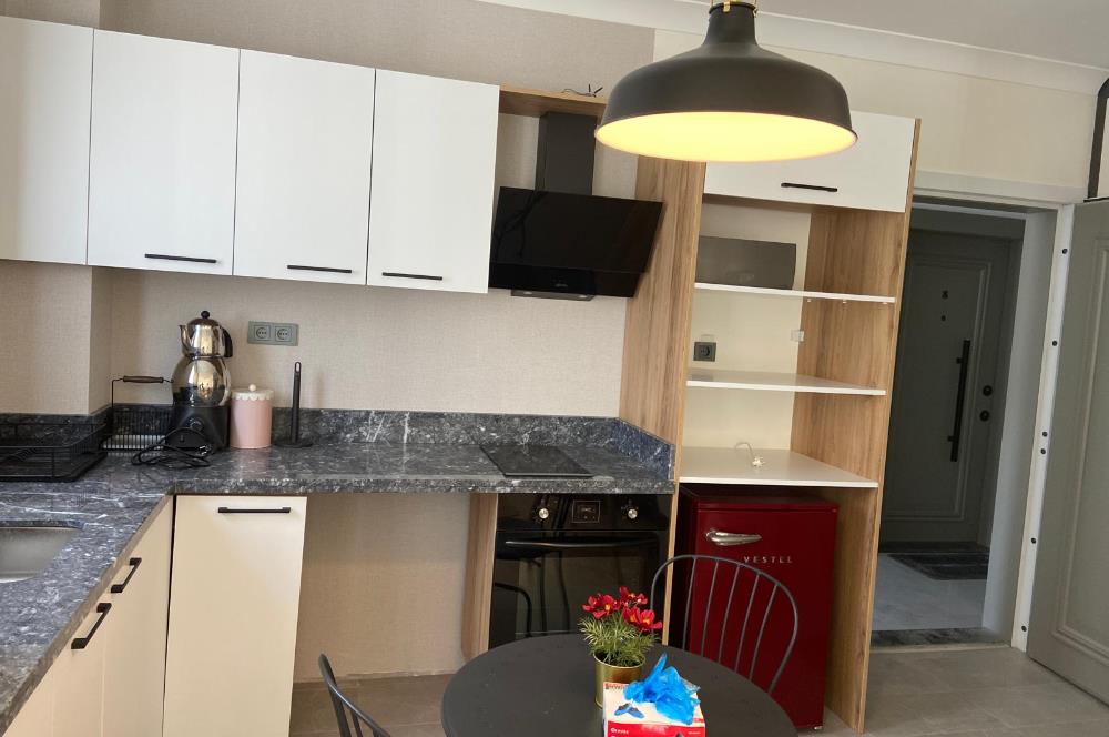 Taşpınar'da Bulvara Yakın Eşyalı Kiralık 1+1
