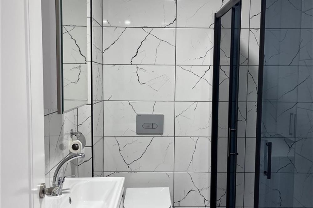 ADLİYE,AVM VE ŞEHİR HASTANESİ YAKINI EŞYALI SATILIK 2+0 DAİRE