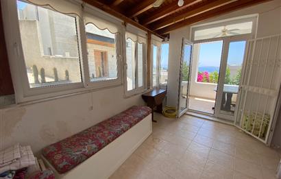 Bodrum Umurca’da Satılık Kısmi Deniz Manzaralı Geniş 2+1 Giriş Katı Daire