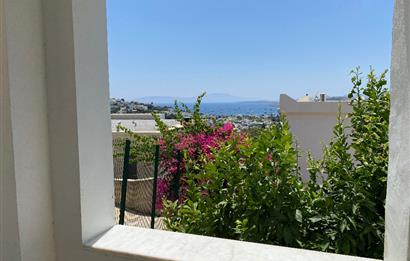 Bodrum Umurca’da Satılık Kısmi Deniz Manzaralı Geniş 2+1 Giriş Katı Daire