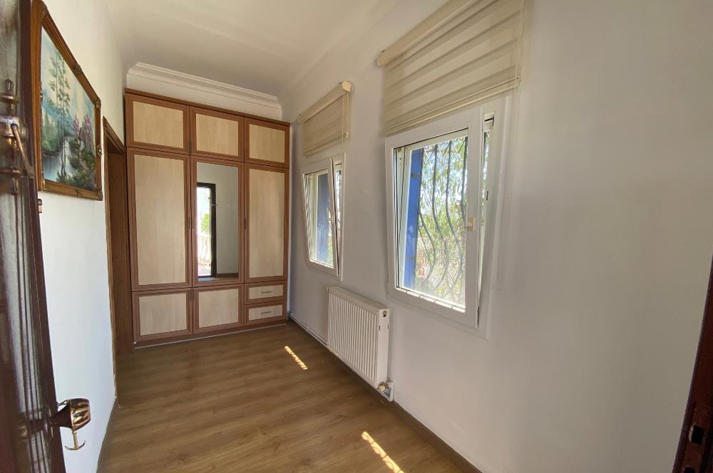 Bodrum Umurca’da Satılık Kısmi Deniz Manzaralı Geniş 2+1 Giriş Katı Daire