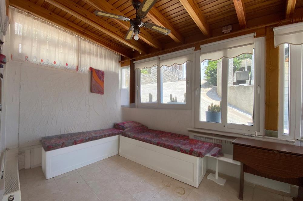 Bodrum Umurca’da Satılık Kısmi Deniz Manzaralı Geniş 2+1 Giriş Katı Daire
