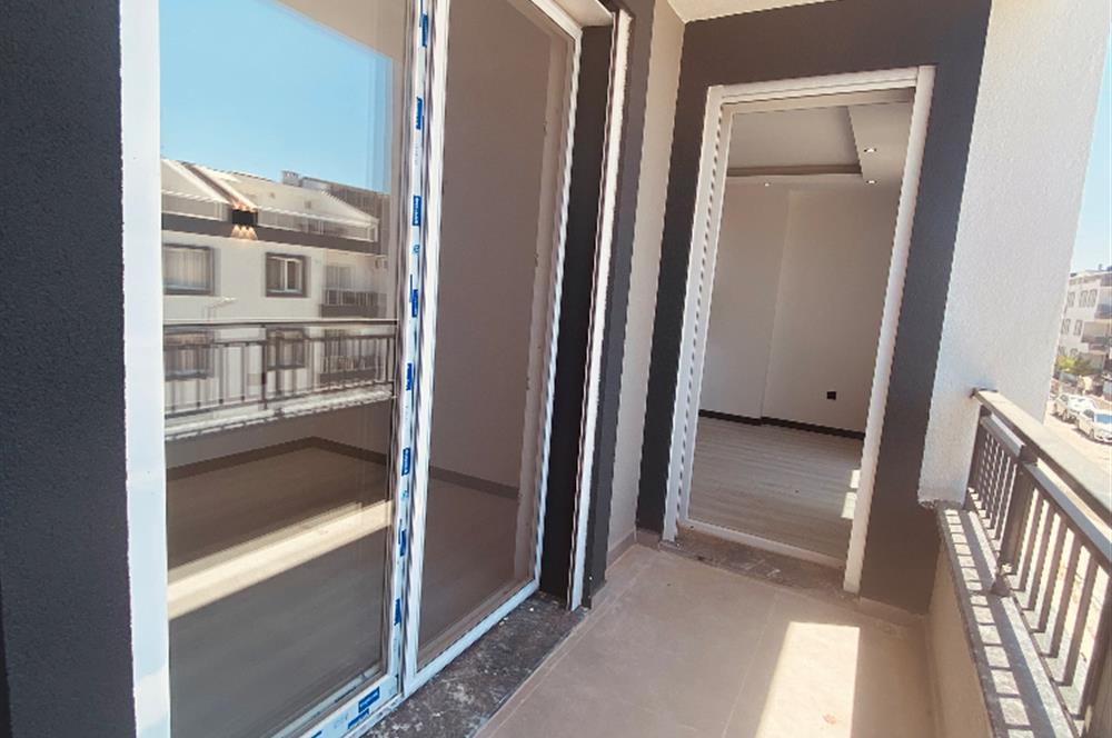 Didim, Hisar Mahallesi'nde Panoramik Deniz Manzaralı – Ön Cephe Sıfır 2+1 Daire 