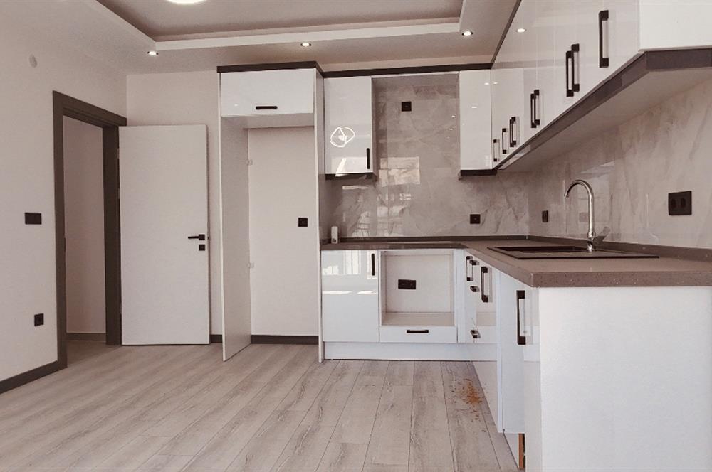 Didim, Hisar Mahallesi'nde Panoramik Deniz Manzaralı – Ön Cephe Sıfır 2+1 Daire 