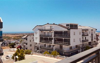 Didim, Hisar Mahallesi'nde Panoramik Deniz Manzaralı – Ön Cephe Sıfır 2+1 Daire 
