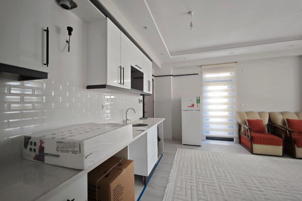 CENTURY 21 BAL'DAN  HASAN BASRİ CANTAY MAHALLESİNDE YÜKSEK GİRİŞ   KİRALIK  1+1 DAİRE  