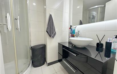 ATAŞEHİR SARİSSA EVLERİNDE HAVUZ MANZARALI 1 + 1 SATILIK DAİRE