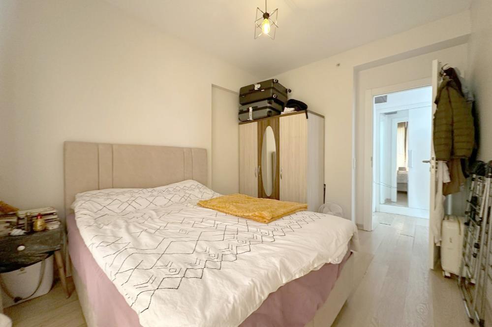 ATAŞEHİR SARİSSA EVLERİNDE HAVUZ MANZARALI 1 + 1 SATILIK DAİRE