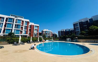 YENİŞEHİR ATLANTİS HOBİ EVLERİNDE HAVUZ CEPHE BOŞ SATILIK 3+1 EV