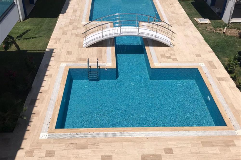 MUĞLA ÖRENDE HAVUZLU BUTİK SİTEDE 2+1 SATILIK DAİRE