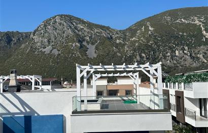 MUĞLA ÖRENDE HAVUZLU BUTİK SİTEDE 2+1 SATILIK DAİRE