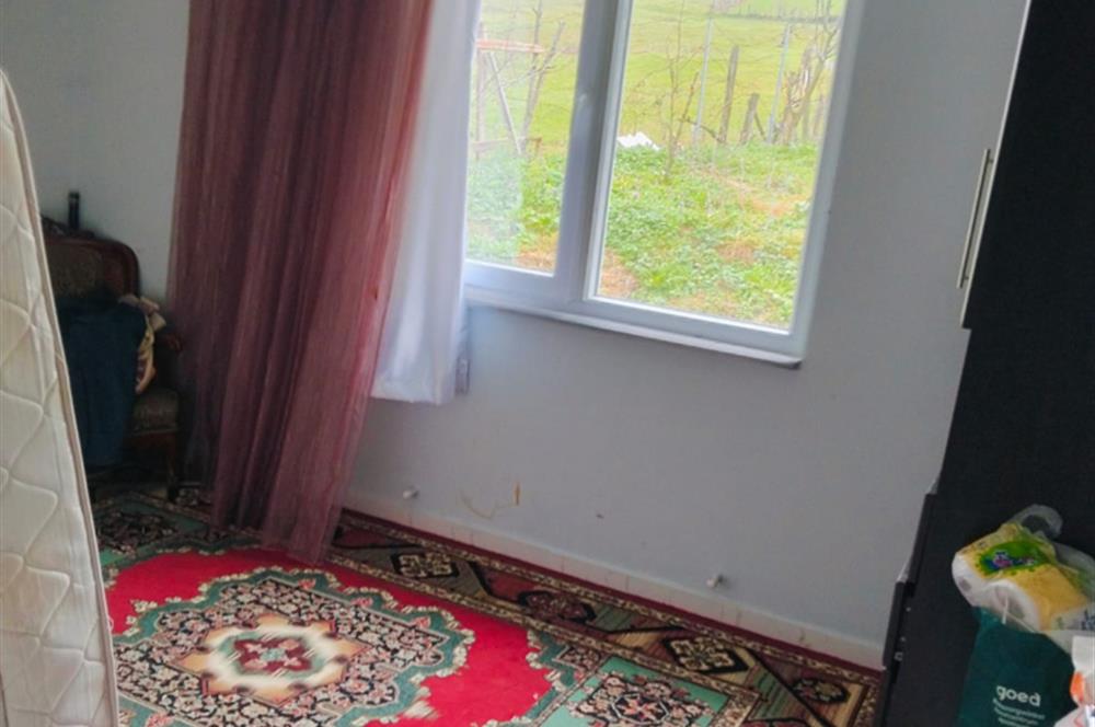 KANDIRA DA , İÇİNDE YAPI KAYIT BELGELİ EV OLAN 1.886 m2 TARLA