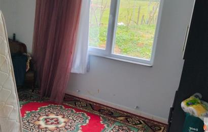 KANDIRA DA , İÇİNDE YAPI KAYIT BELGELİ EV OLAN 1.886 m2 TARLA
