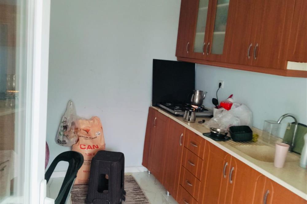 KANDIRA DA , İÇİNDE YAPI KAYIT BELGELİ EV OLAN 1.886 m2 TARLA