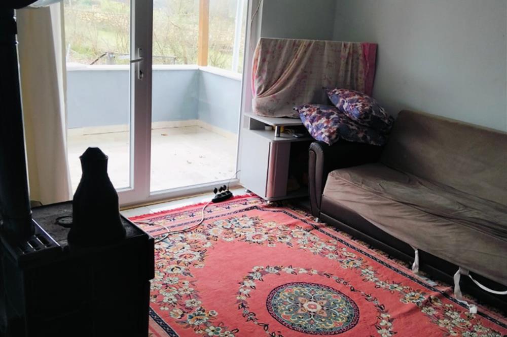 KANDIRA DA , İÇİNDE YAPI KAYIT BELGELİ EV OLAN 1.886 m2 TARLA