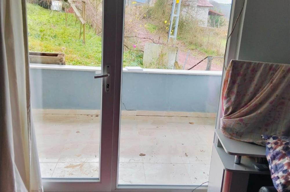 KANDIRA DA , İÇİNDE YAPI KAYIT BELGELİ EV OLAN 1.886 m2 TARLA