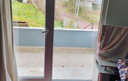 KANDIRA DA , İÇİNDE YAPI KAYIT BELGELİ EV OLAN 1.886 m2 TARLA