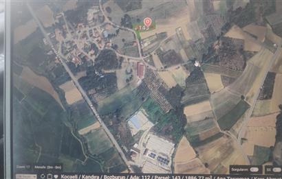 KANDIRA DA , İÇİNDE YAPI KAYIT BELGELİ EV OLAN 1.886 m2 TARLA