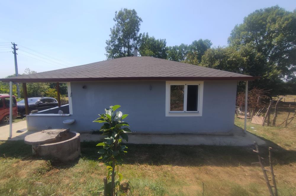 KANDIRA DA , İÇİNDE YAPI KAYIT BELGELİ EV OLAN 1.886 m2 TARLA