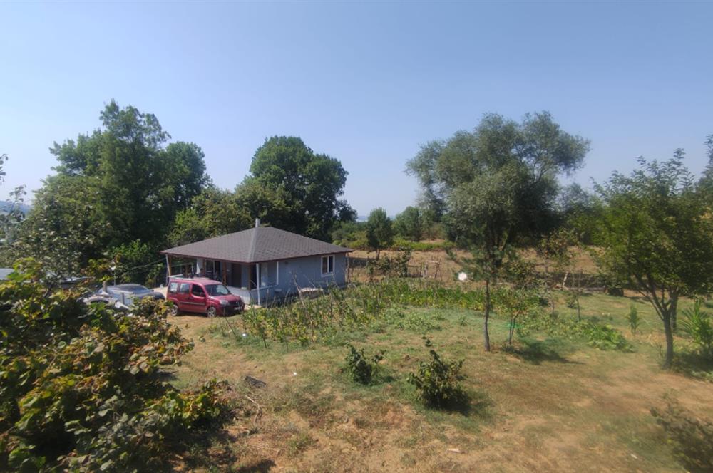 KANDIRA DA , İÇİNDE YAPI KAYIT BELGELİ EV OLAN 1.886 m2 TARLA