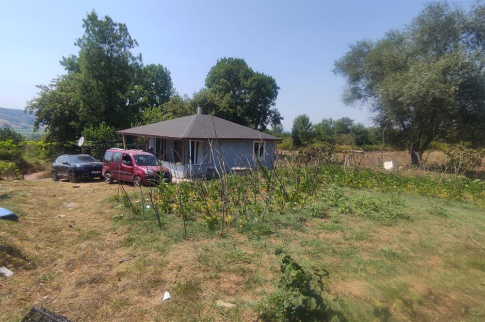 KANDIRA DA , İÇİNDE YAPI KAYIT BELGELİ EV OLAN 1.886 m2 TARLA