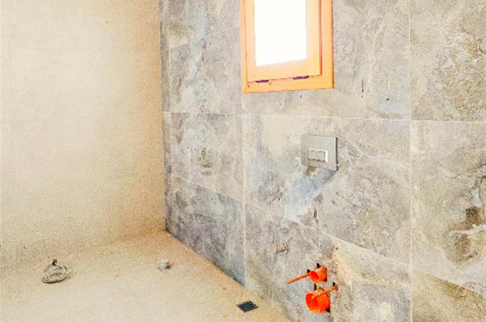 Datça Karaköyde 220 m2 Arsa içinde Taş ev ve Müştemilatı 