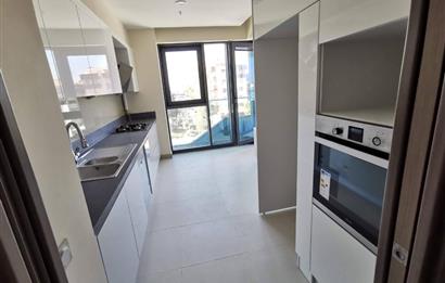 BAŞKENT EMLAK KONUTLARINDA CAM BLOK KATTA 2+1