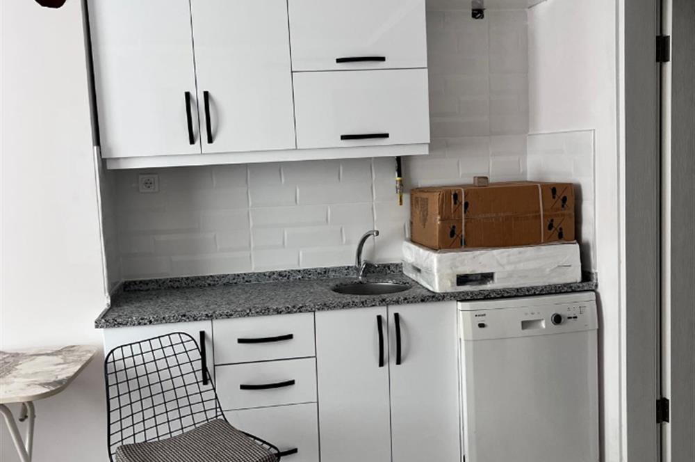 BAHÇELİEVLER'DE SIFIR EŞYALI SATILIK 1+1 DAİRE