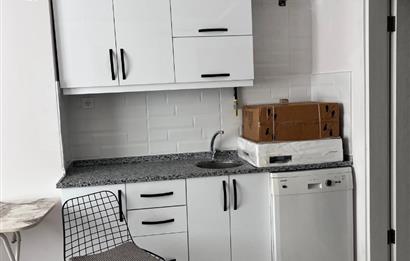 BAHÇELİEVLER'DE SIFIR EŞYALI SATILIK 1+1 DAİRE