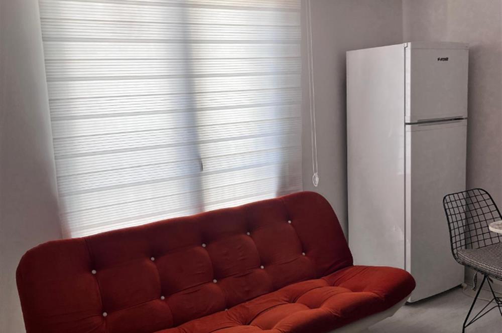 BAHÇELİEVLER'DE SIFIR EŞYALI SATILIK 1+1 DAİRE