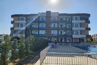 C21 BAL'DAN AYVALIK ALTINOVADA HAVUZ CEPHELİ SATILIK SIFIR 2+1 DAİRE