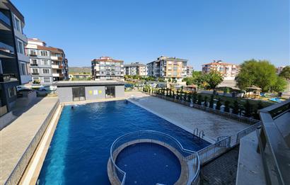 C21 BAL'DAN AYVALIK ALTINOVADA HAVUZ CEPHELİ SATILIK SIFIR 2+1 DAİRE
