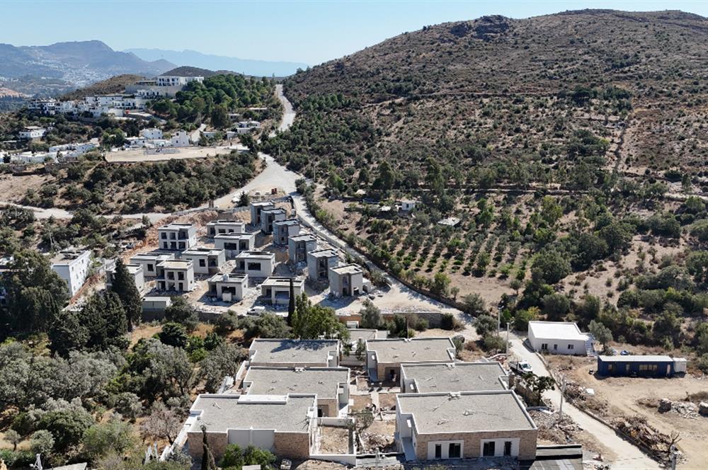 Bodrum Gümüşlük - Magnus Vadi Dereköy Projesinde Müstakil Bahçe Kullanımlı Vadi Manzaralı Satılık Sıfır Daireler