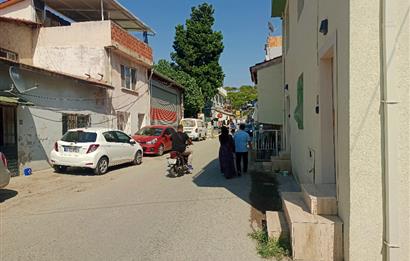 Ayvalık Hamdibeyde cadde üstü 105m² Arsa + 2 Ev