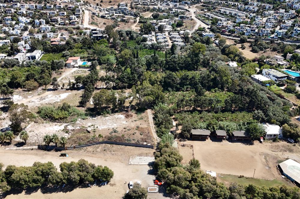 Gümüşlükte Denize 220m Mesafede Denize 2.Parsel Yüksek Prim Potansiyelli 4.746 m2 İmarlı Arsa