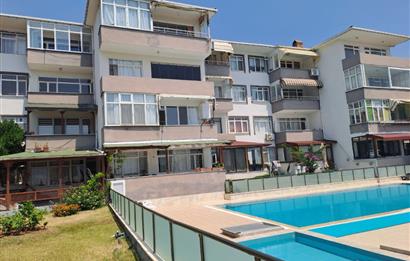 ŞİRİNYALIDA SİTE İÇİNDE DENİZ MANZARALI SATILIK EŞYALI 2+1 DAİRE