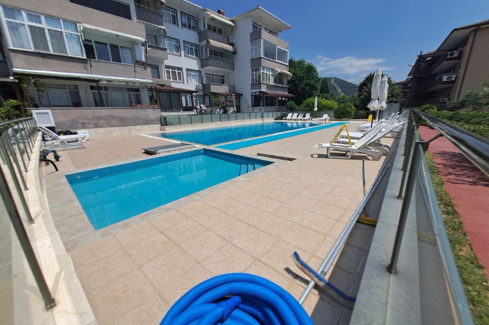 ŞİRİNYALIDA SİTE İÇİNDE DENİZ MANZARALI SATILIK EŞYALI 2+1 DAİRE