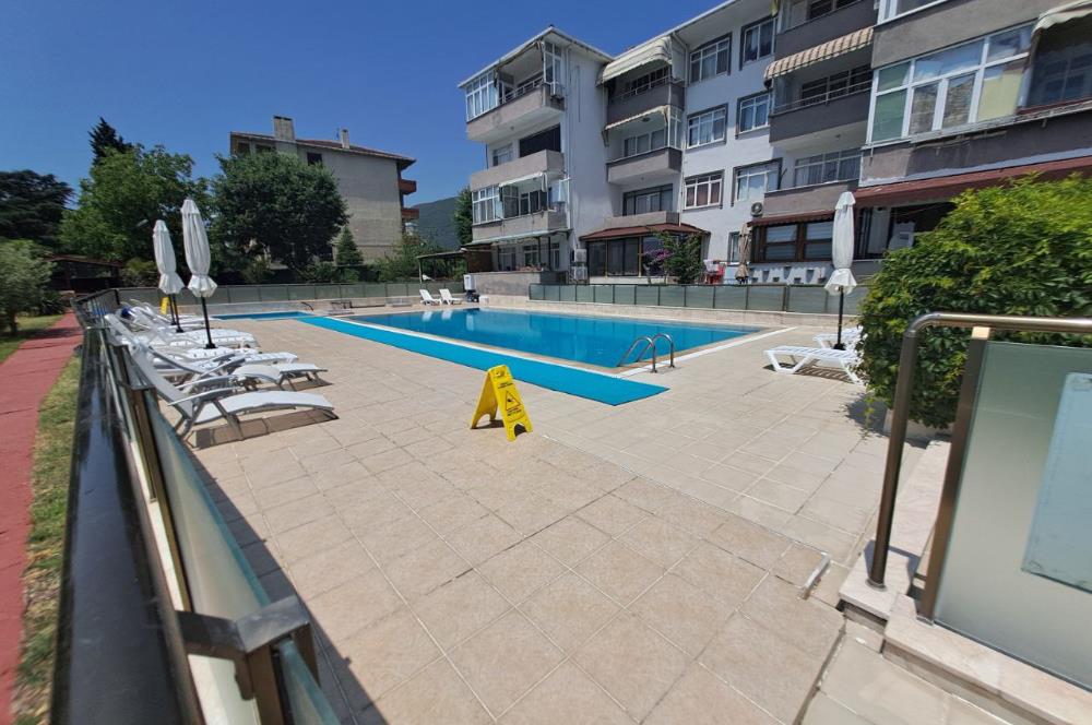 ŞİRİNYALIDA SİTE İÇİNDE DENİZ MANZARALI SATILIK EŞYALI 2+1 DAİRE