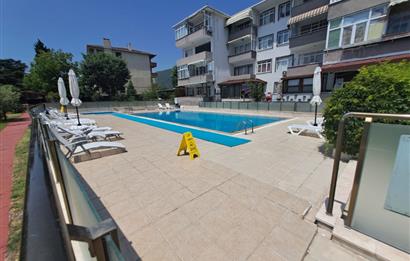 ŞİRİNYALIDA SİTE İÇİNDE DENİZ MANZARALI SATILIK EŞYALI 2+1 DAİRE