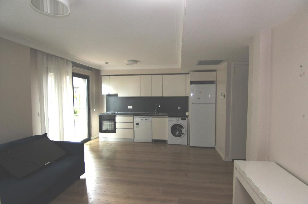 KOÇ BATI YURDUNA KOMŞU KİRALIK 1+1 BAHÇELİ DAİRE