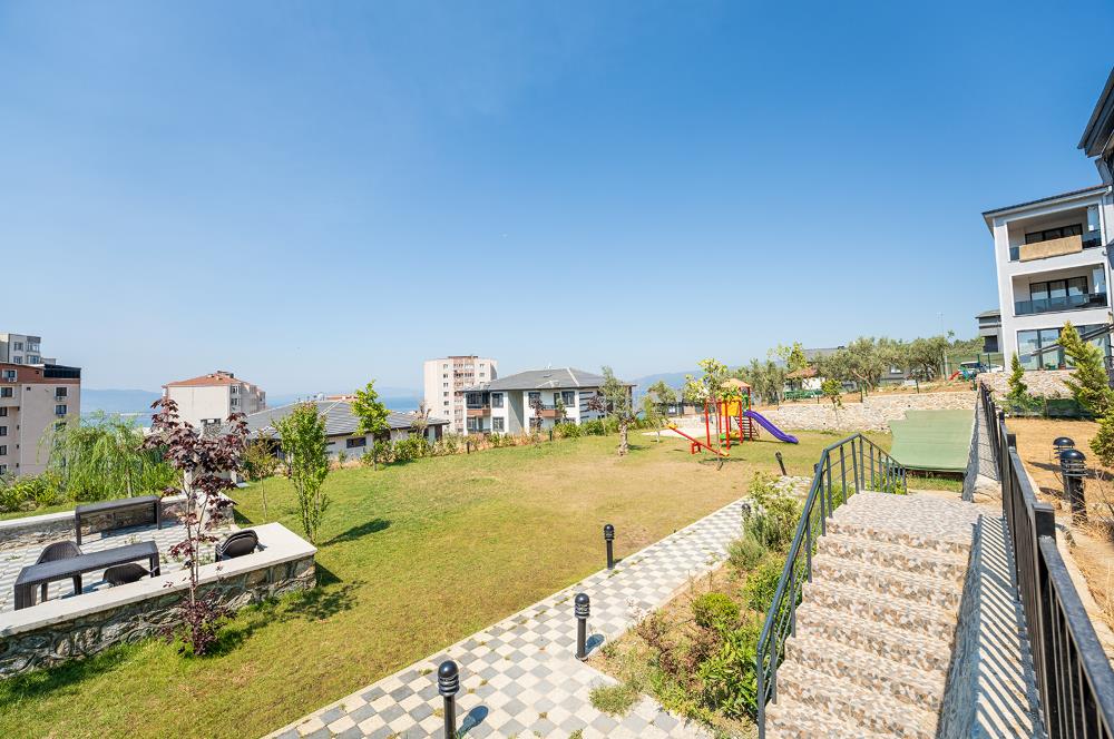 C21 Cius; Havuz ve Bahçeli Site İçerisinde Deniz Manzaralı Daire