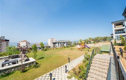 C21 Cius; Havuz ve Bahçeli Site İçerisinde Deniz Manzaralı Daire