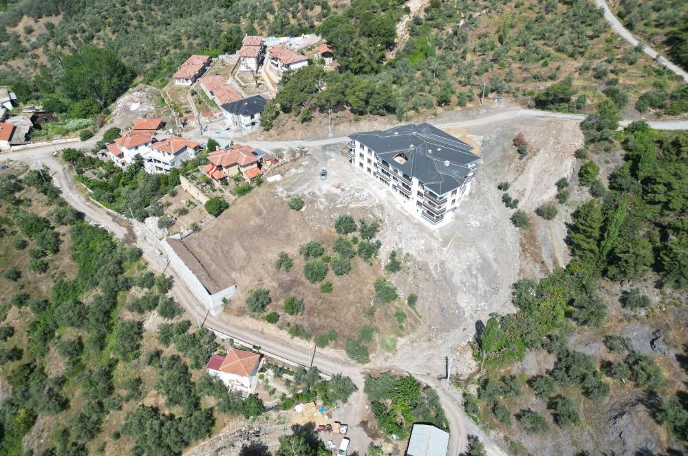 ALTINOLUK NARLI'DA DENİZ MANZARALI %40 KÖY İMARLI ARSA 