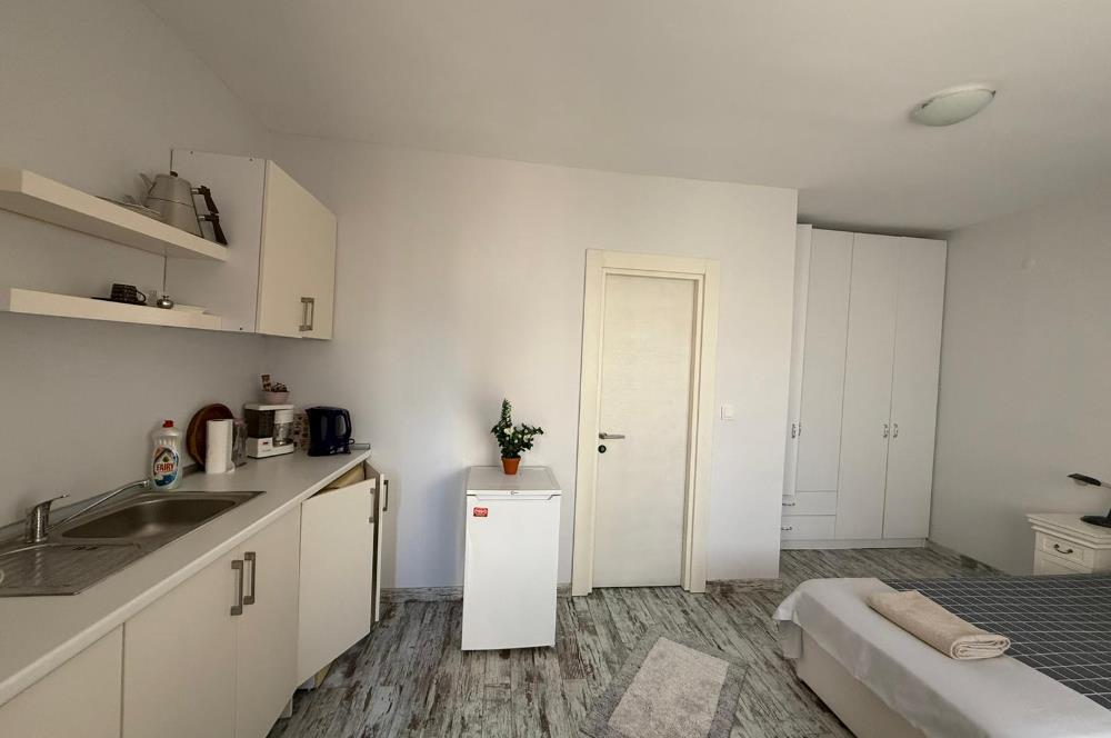 Bodrum Türkbükü’nde Denize Yürüme Mesafesinde Eşyalı 1+0 Yıllık Kiralık Daire