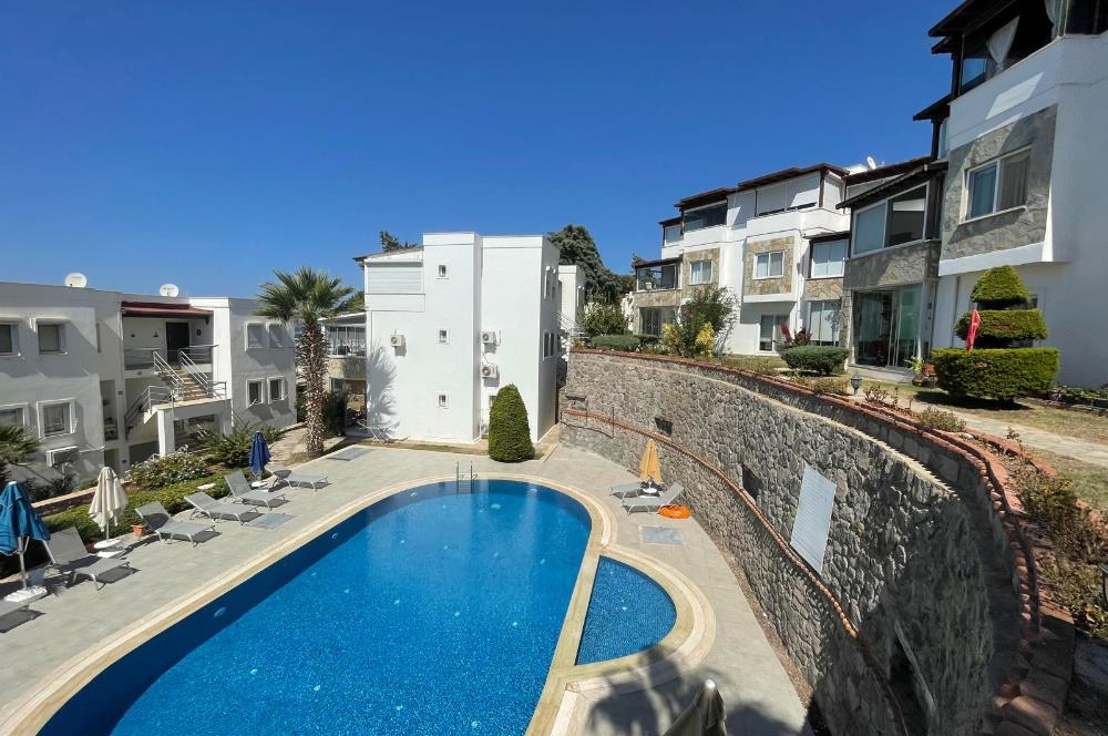 Turgutreis Yalı 2+1 Satılık Havuzlu Site İçerisinde Bahçekatı Daire 